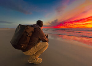 Class participant photographing sunrise.