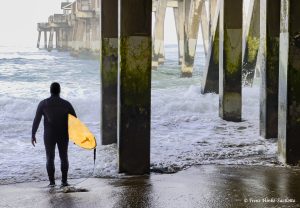 Surfer at Jeannette Pier Outer Banks NC by Osprey Photo Workshops